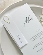 Silver teardrop paperclips clipping RSVP card to wedding invitation