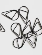 Teardrop paperclips in gold finish as wedding stationery finishing touch